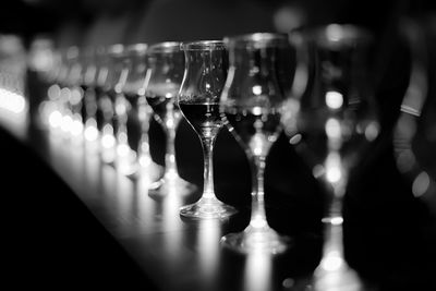 Close-up of wineglasses on table