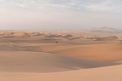 Scenic view of desert against sky