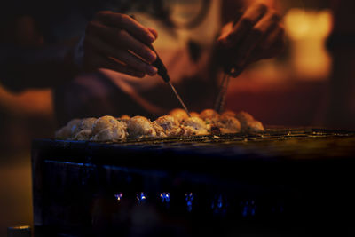 Close-up of person preparing food