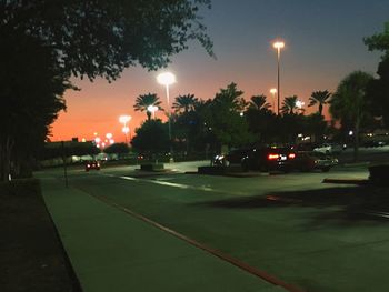 View of vehicles on road at night