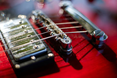 Macro details of guitar strings, close up. electric guitar. colour photography, low deep of field