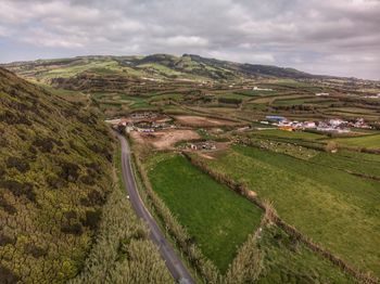 The road to the back of the green hill