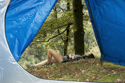 Nature retreat woman finds peace and relaxation in the wilderness