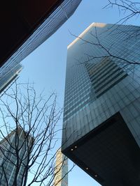 Low angle view of skyscrapers against sky