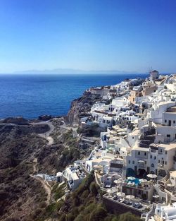 View of townscape against blue sky
