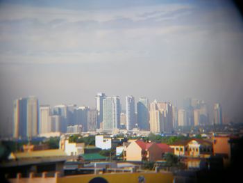 Modern cityscape against sky