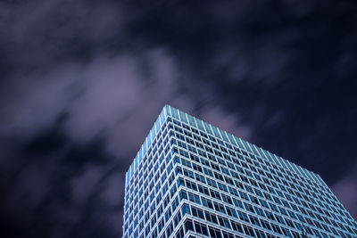 Low angle view of skyscraper against sky