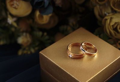 Close-up of wedding rings on jewelry box