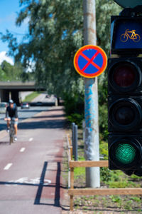 Road sign on street in city