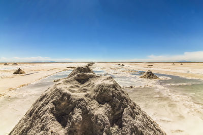 Panoramic view of desert against sky