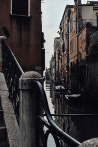 Canal passing through city buildings