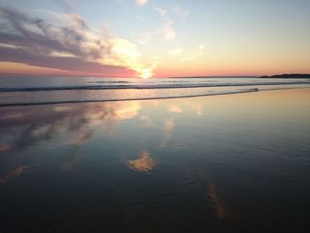 Scenic view of sea against sky at sunset