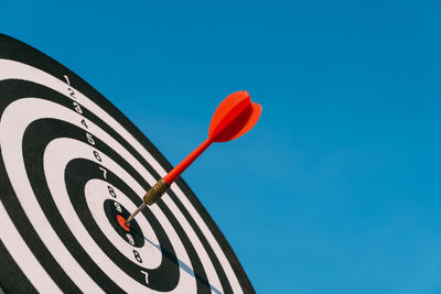 Low angle view of sports target against blue sky