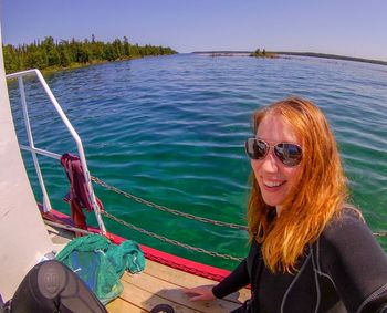 Woman in boat on lake