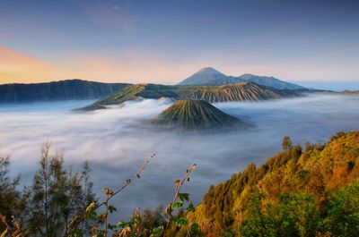 Scenic view of volcanic mountain against sky