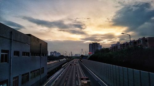 Cityscape against sky during sunset