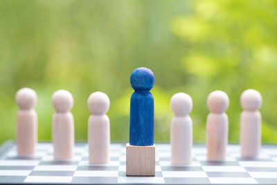 Close-up of chess pieces on table