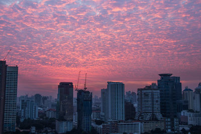 Cityscape against sky during sunset