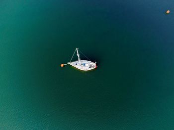 High angle view of sailboat sailing in sea