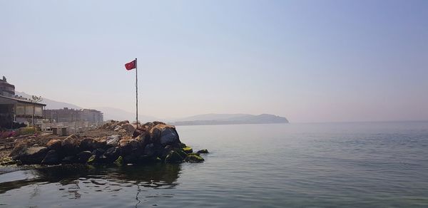 Scenic view of sea against clear sky
