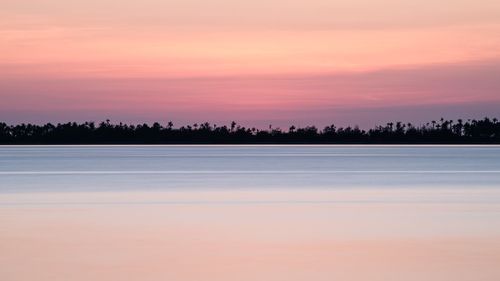 Scenic view of landscape at sunset