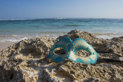 Scenic view of sea shore against clear sky