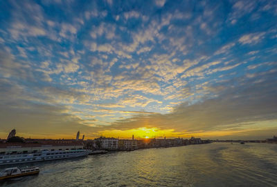 View of river against cloudy sky