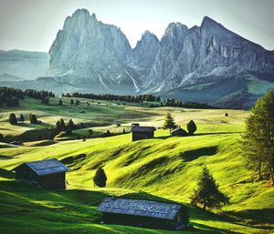 Scenic view of landscape and mountains against sky