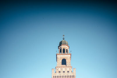 Low angle view of church against clear blue sky