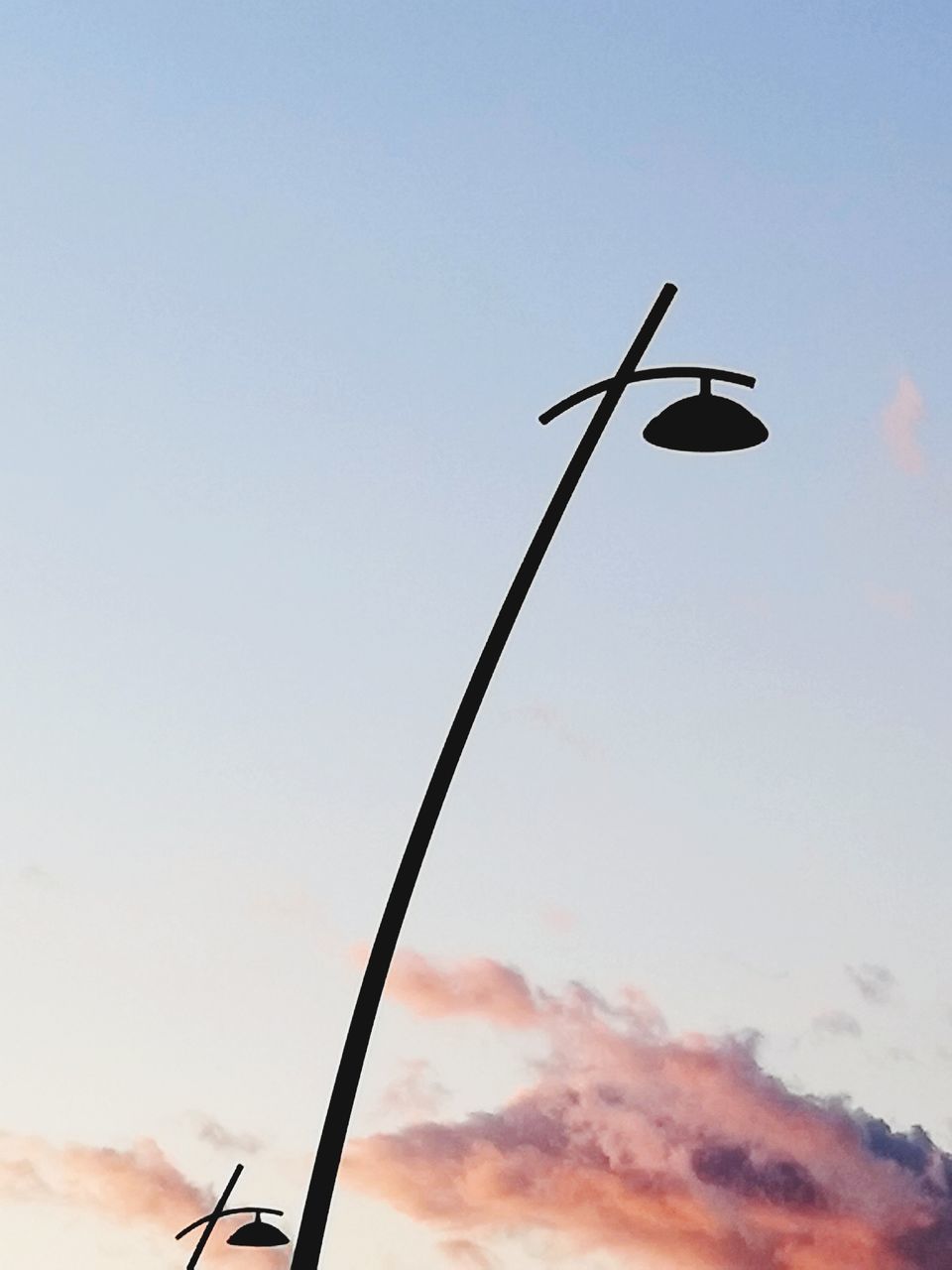 LOW ANGLE VIEW OF A STREET LIGHT AGAINST SKY