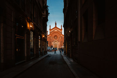 View of the church of santa maria del carmine with people walking