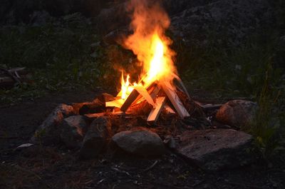 Bonfire on field at night