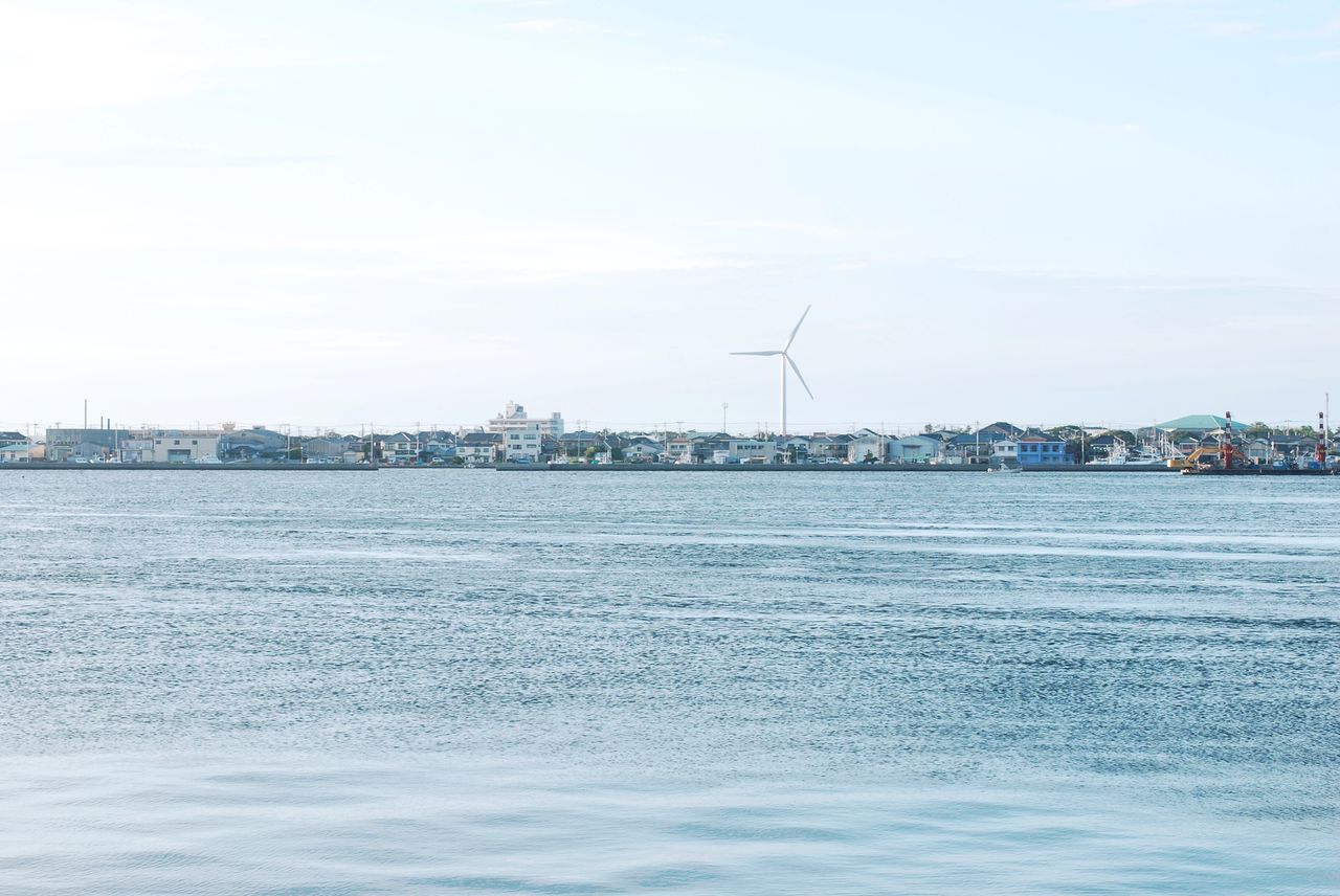 water, sea, waterfront, sky, day, outdoors, no people, alternative energy, nature, built structure, nautical vessel, architecture, wind power, building exterior, wind turbine, windmill, beauty in nature, city
