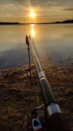 Scenic view of sunset over lake