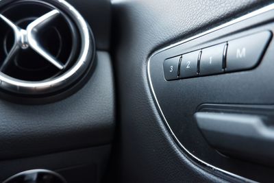 Close-up of push buttons in car