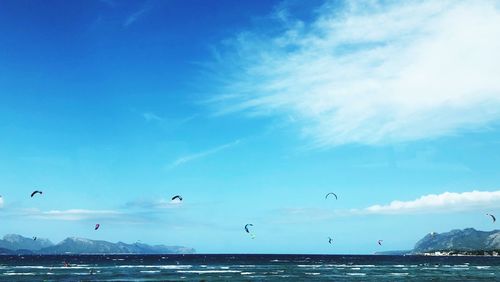 Scenic view of sea against blue sky