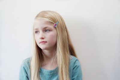 Portrait of young woman looking away