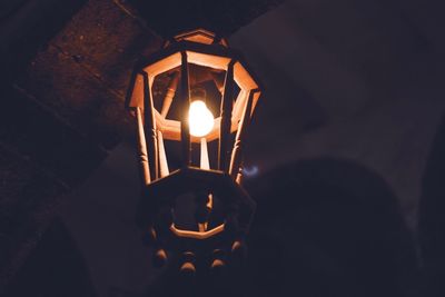 Low angle view of illuminated light bulb