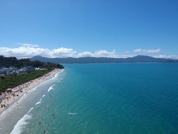 Scenic view of sea against blue sky