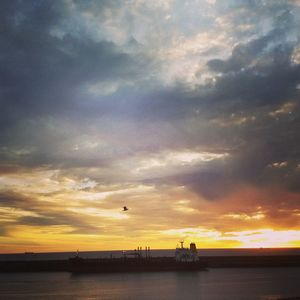 View of calm sea at sunset