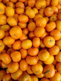 Full frame shot of oranges in market