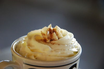 Close-up of ice cream over white background