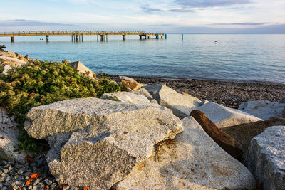 View of pier over sea against sky