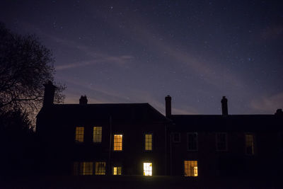 Low angle view of illuminated built structure