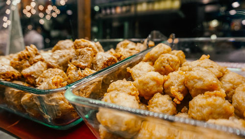 Close-up of serving food in tray