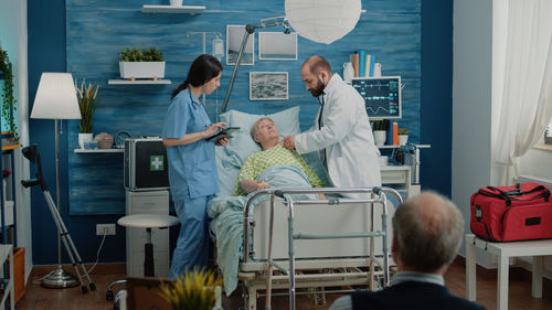 Group of people sitting at home