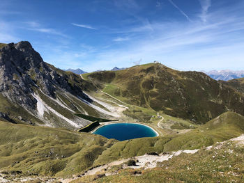 Scenic view of landscape and mountains against sky