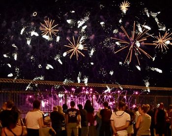 Group of people in the dark