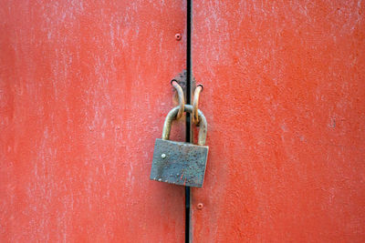 Close-up of padlock on door