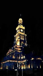 Low angle view of illuminated building at night
